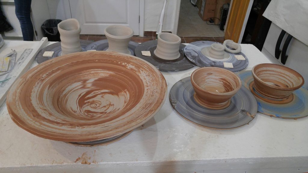 terracotta and white clay mixed bowls created in intermediate wheel throwing class