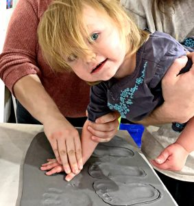 Handprints and Footprints in Clay